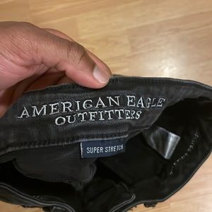 American Eagle Black Ripped Denim “Super Stretch,”